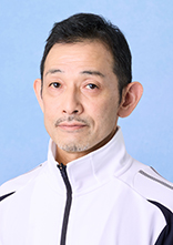 三角　哲男